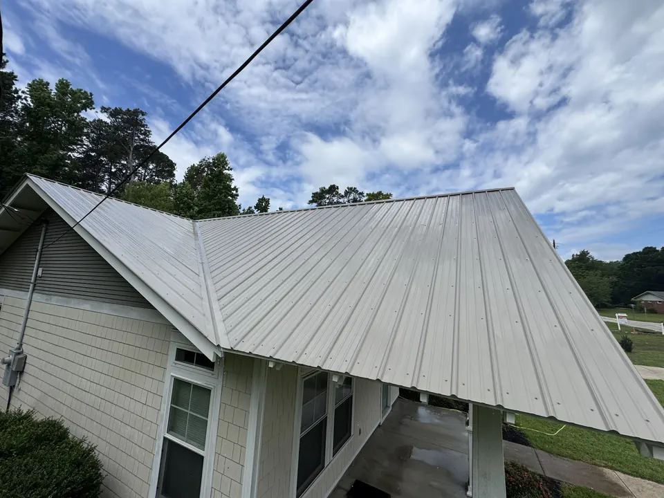 Same metal roof clean and bright after cleaning