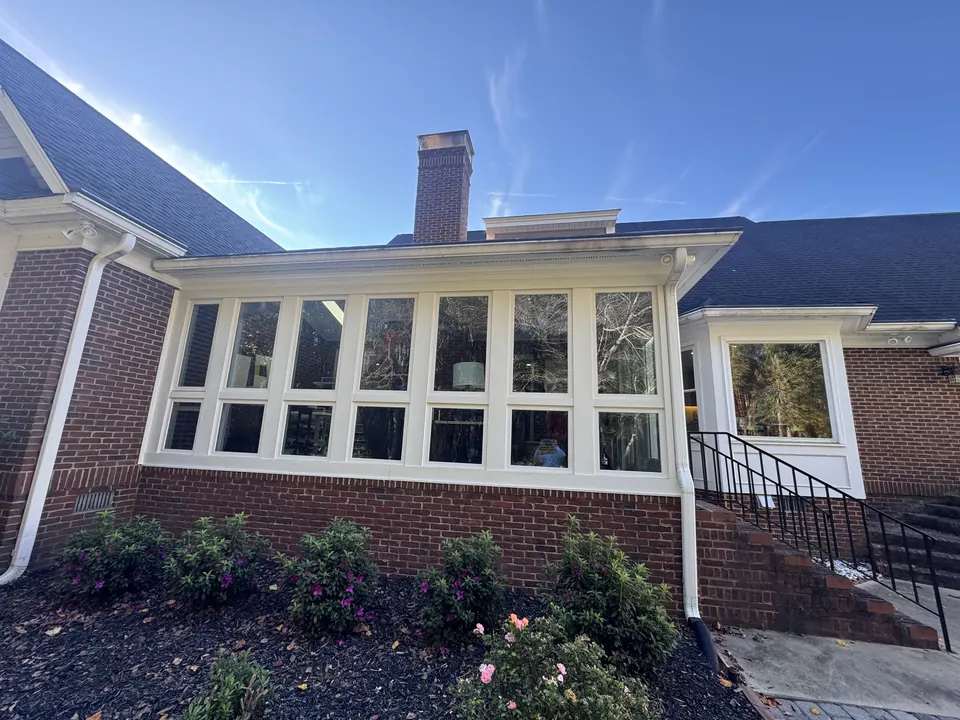 Sunroom windows on a brick home, clean and clear