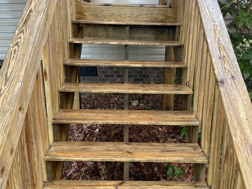 Wood stairs with warm natural color restored after cleaning